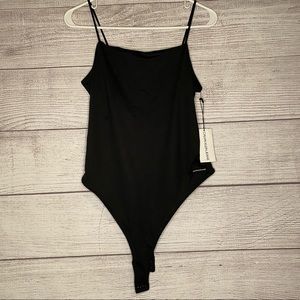 Calvin Klein Jeans Women’s black body suit with snaps- small new with tags